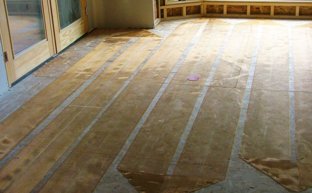 Zmesh electric radiant flooring heating being installed for under hardwood flooring